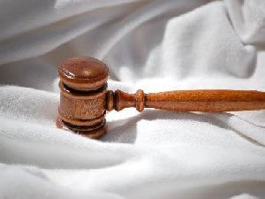 gavel on white sheet